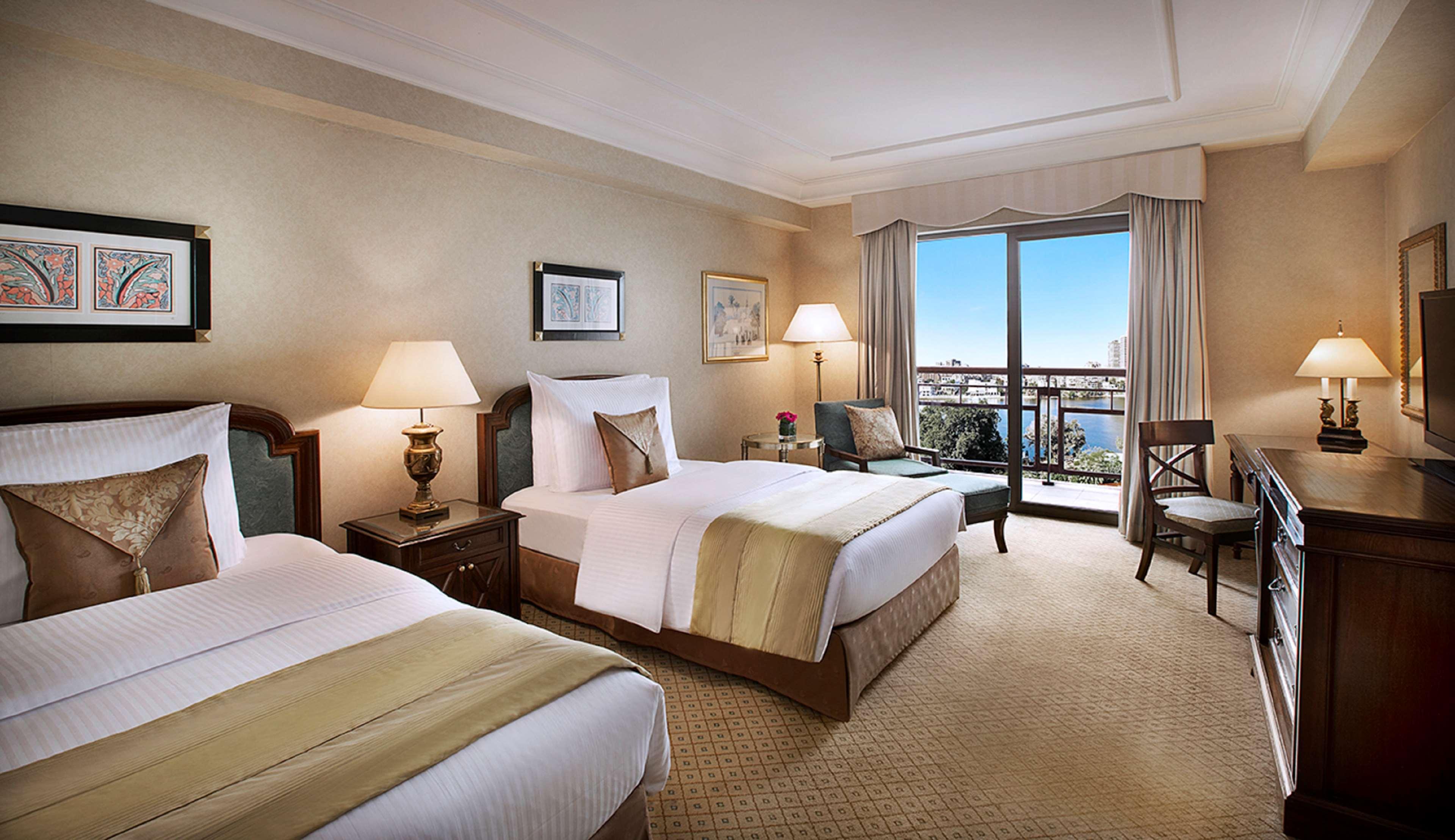 Hotel Sofitel Cairo Downtown Nile Extérieur photo A guest room at the Conrad Hilton Cairo